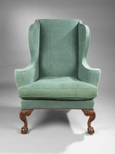 George II carved walnut wing armchair