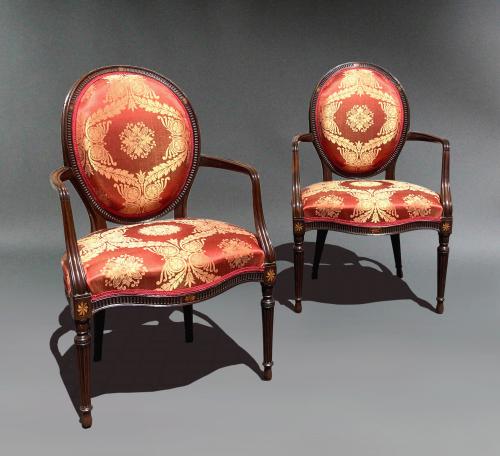 George III mahogany armchairs in red damask; manner of John Linnell