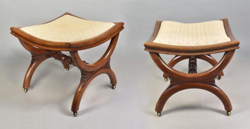 Pair of George IV X-framed mahogany stools with dished seats, c.1820