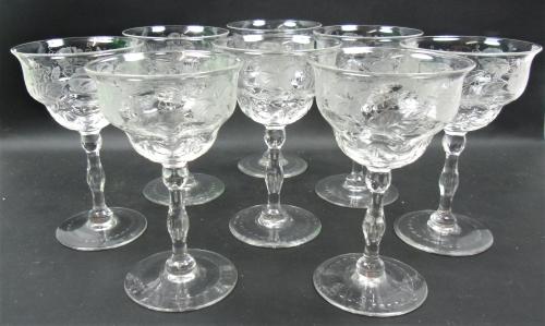 A set of eight crystal champagne glasses with etched and intaglio cut decoration, (marked) Webb, English circa 1920