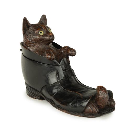 Black Forest fruitwood carving of a cat in a boot