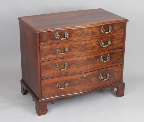A fine mahogany serpentine chest of drawers 