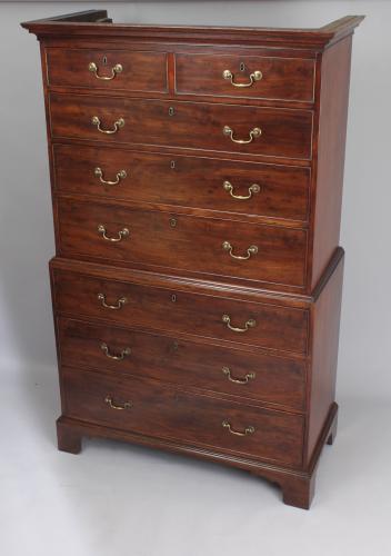 Fine quality figured plum pudding mahogany chest on chest tallboy of especially small size