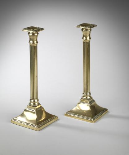 Georgian Neoclassical brass candlesticks