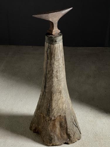 Unusual small anvil nicely mounted on heavy timber stand 18th Century