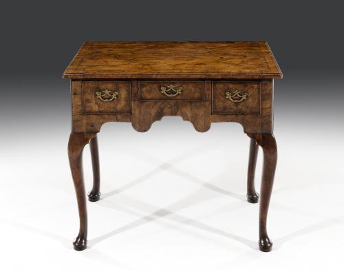 George I Walnut and Feather Banded Lowboy