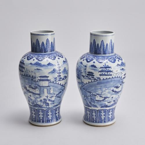 A large pair of antique Chinese blue and white porcelain vases with Temple decoration (Circa 1870)