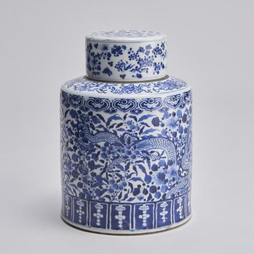 A large, circular form 19th Century Chinese porcelain blue and white covered jar