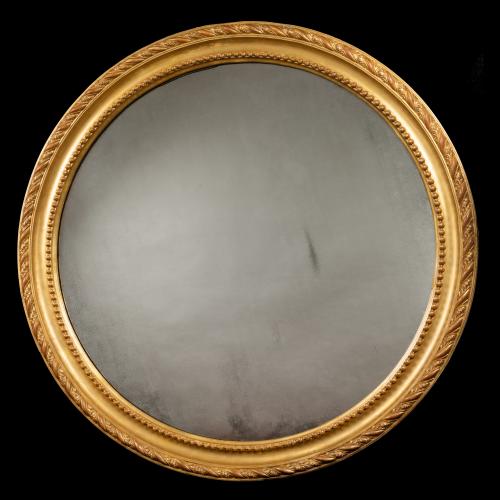 Nineteenth Century round giltwood mirror