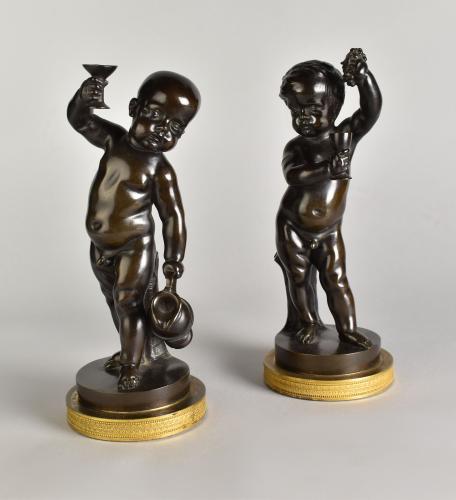 Pair of bronzes of the infant Bacchus