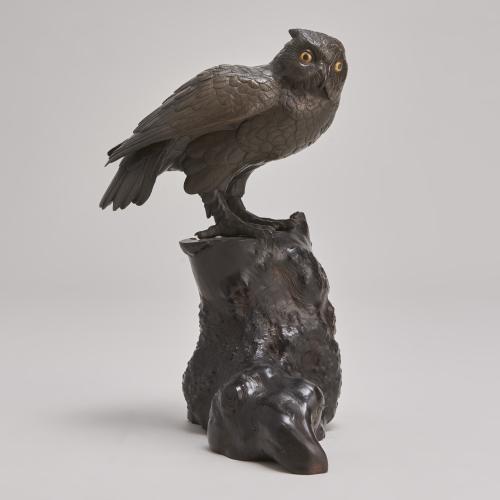 An attractive Japanese Bronze Okimono of an Owl on a gnarled wood stand (Circa 1880)