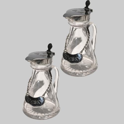 Pair of  Edwardian silver mounted glass whisky noggins