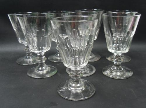 A set of eight glass Wellington pattern rummers with polished pontils English circa 1840