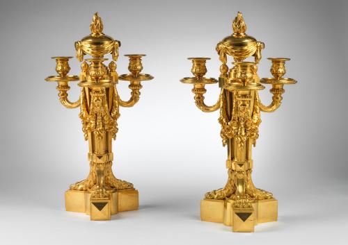 A Pair of Louis XVI Ormolu Three Light Candelabra with a Brule Perfume Vase Attributed to Jean-Louis Prieur.  Circa 1765
