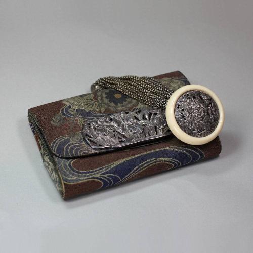 Tobacco pouch with ivory and silver netsuke