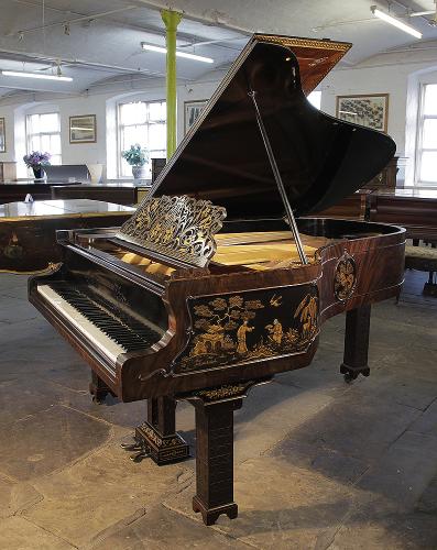 Chinese Chippendale style, 1899, Schiedmayer grand piano with a flame mahogany case and Malborough legs