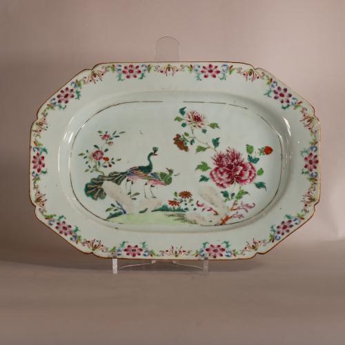 One of a pair of Chinese famille rose double peacock platters, Qianlong