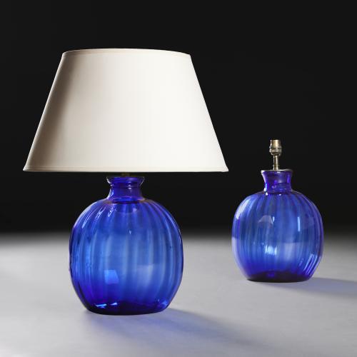 A Pair of Gadrooned Blue Glass Lamps