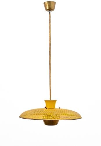 perforated steel and brass hanging pendant light by Metalarte