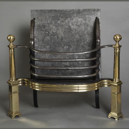 An 18th century George II steel and brass firegrate