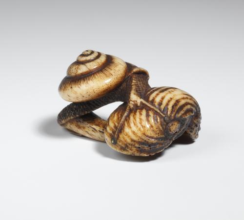 A stag netsuke of a snail on reishi with a carved seal at the base of the stem: Koku[sai], circa 1860s - 1880s