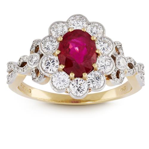 Oval ruby and brilliant cut diamond engagement ring