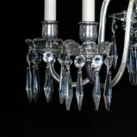 A Set of Four Cut Crystal Six-Light Silvered Wall Appliques