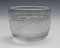 A fine set of sixteen diamond cut glass Regency finger bowls