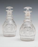 An Unusual Pair of Regency Decanters with Radial Cut Panels
