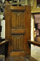 16TH CENTURY ENGLISH OAK BOX SEATED LINENFOLD CAQUETEUSE TYPE ARMCHAIR. CIRCA 1570.