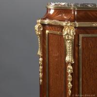 A Marquetry Inlaid Side Cabinet With A Marble Top