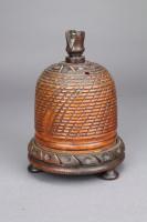 A lignum vitae 'beehive' string barrel, mid 19th century