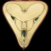 An outstanding Archibald Knox gold and enamel necklace