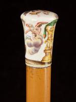 A fine example of a knop-shaped enamel handled cane_d