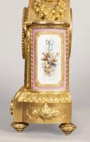 A Mantlepiece Clock in the Louis XVI Manner Retailed by E & S Watson of London