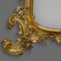 A Large Rococo Style Carved Giltwood And Silver Gilt Mirror
