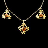 A Jessie King gold and citrine Liberty necklace