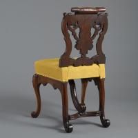 Six Baroque walnut chairs