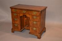 A George II walnut dressing table.