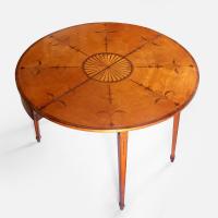 A fine quality Adam period satinwood and marquetry tea table