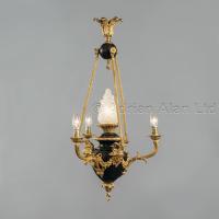 A Louis XVI Style Gilt and Patinated Bronze Four-Light Chandelier