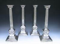 A Set of Four George III Sterling Silver Candlesticks