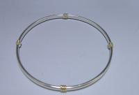 A Sterling Silver and 9ct Gold Bangle