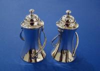 Pair of Art Nouveau Silver Pepper Pots