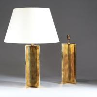 A Pair of Brass Patinated X Form Lamps