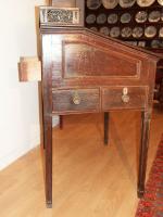 An unusual, late-18th century, mahogany estate bureau fitted with numerous secret drawers