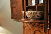  A George II oak standing corner cupboard 