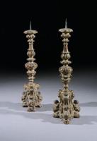 A matched pair of large, 19th century Italian carved beech candlesticks
