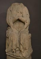 A pair of 14th/15th century limestone figures depicting The Annunciation.