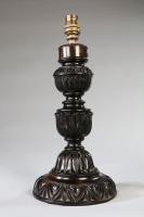 An Anglo Sinhalese Carved Ebony Lamp